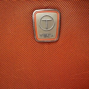 Tumi T-Tech Burnt Orange Travel Bag